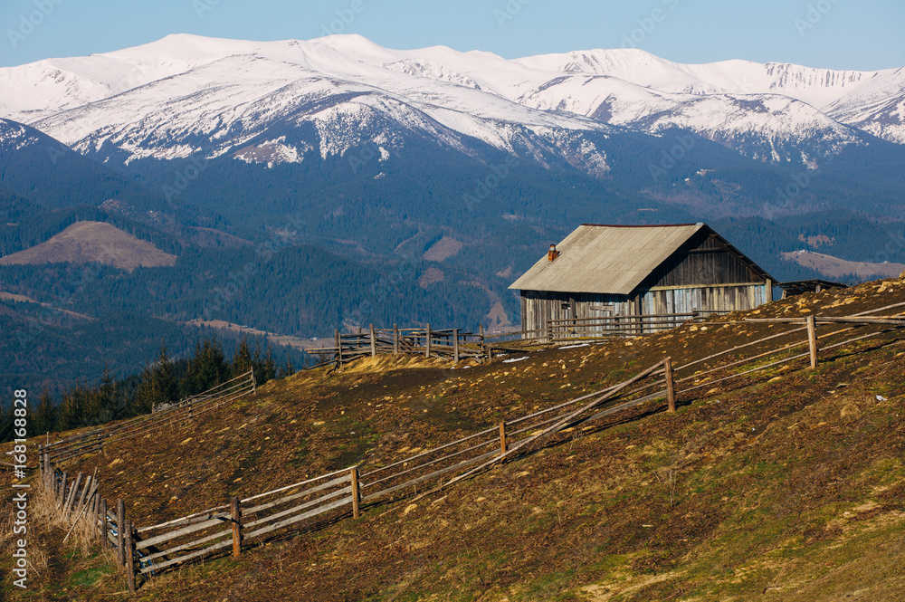 wooden house in winter mountain background wooden house in winter mountain background