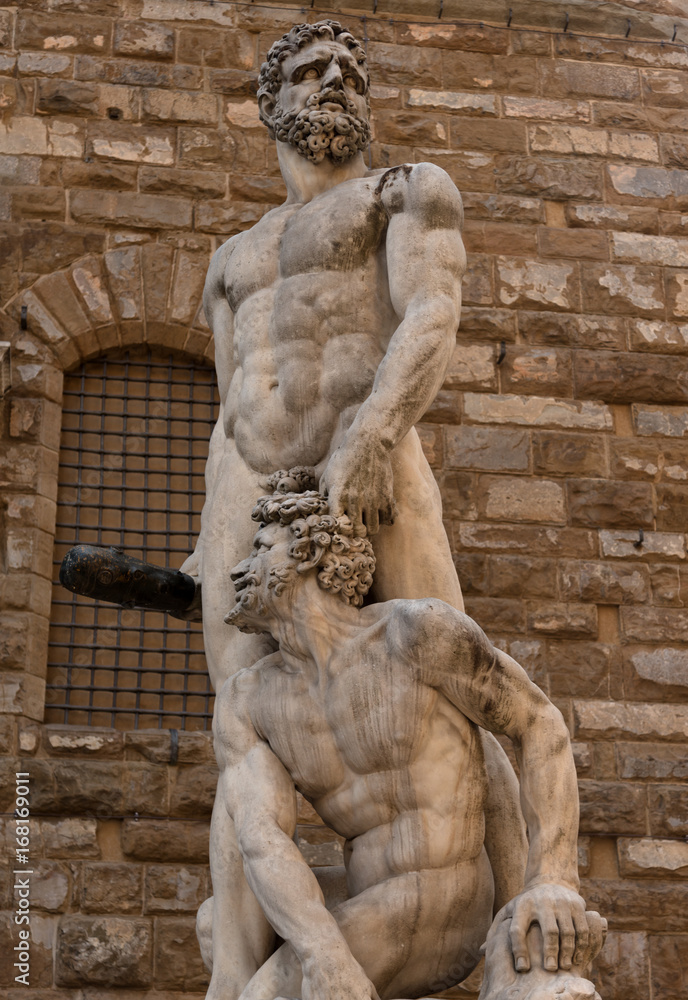 Statue in front of the Facade of Old Palace called Palazzo Vecchio at the Piazza della Signoria in Florence, Tuscany, Italy