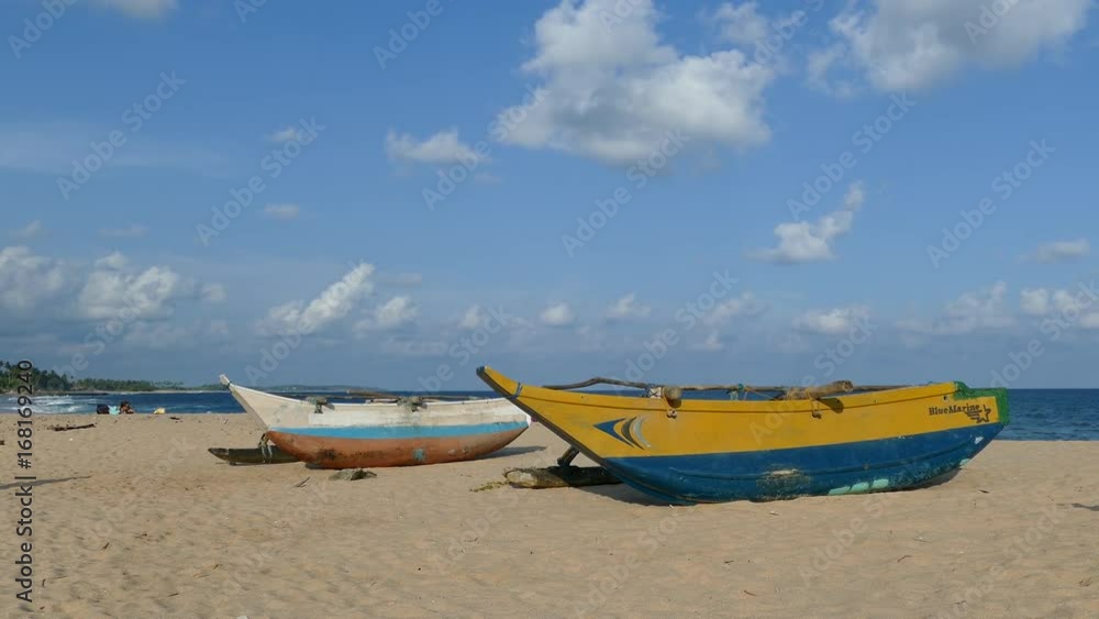 Traditional catamaran Fishing boats at Tangalle beach in Sri Lanka Traditional catamaran Fishing boats at Tangalle beach in Sri Lanka