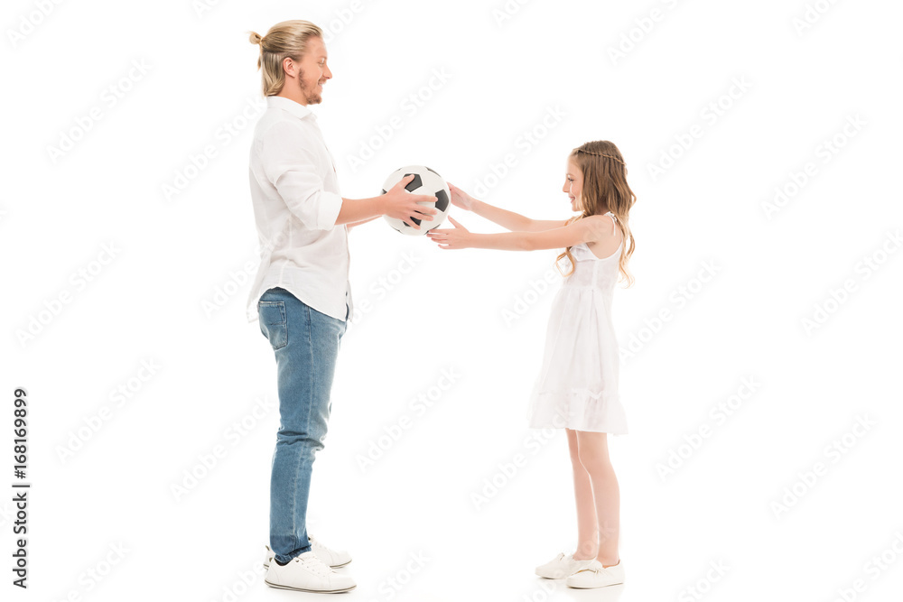father and daughter with soccer ball father and daughter with soccer ball