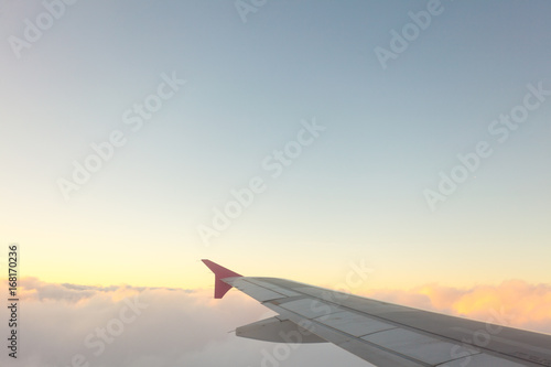 View from plane window, cloud sky