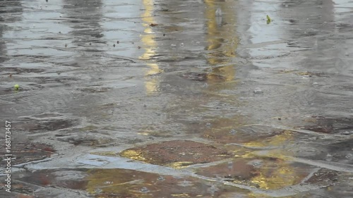 Rain drops to the ground.