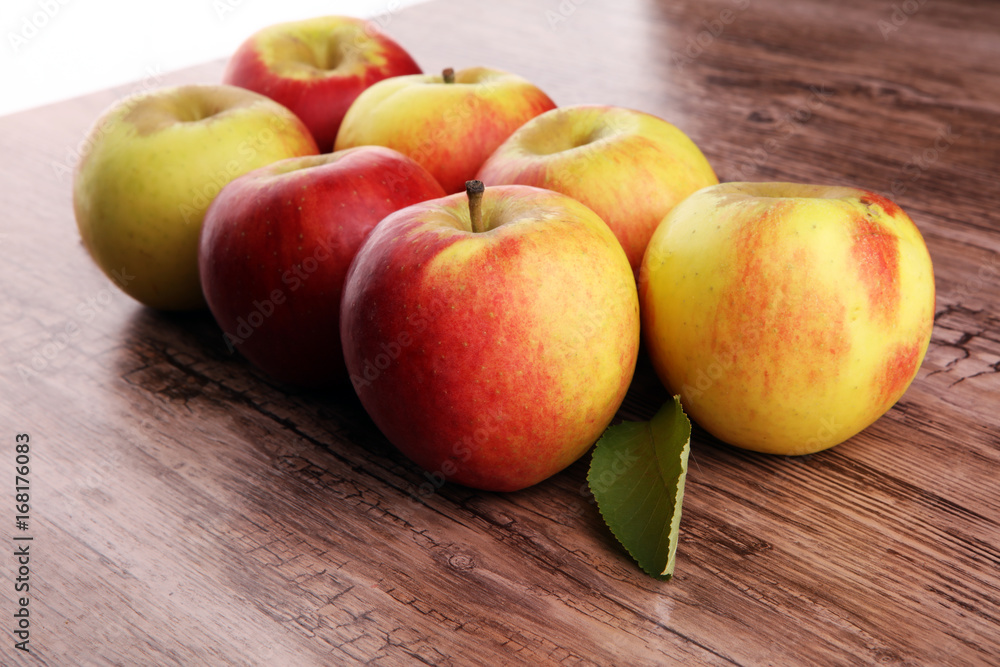 Ripe red apples on wooden background summer concept Ripe red apples on wooden background summer concept