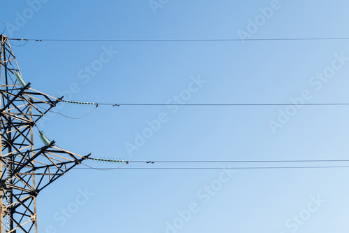 High-voltage electric support at the edge of the frame. Power electric wires run horizontally.