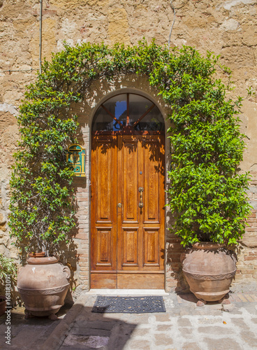 Traditional Italian village, a door in an old house