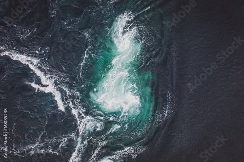 Whirlpools of the maelstrom of Saltstraumen, Nordland, Norway. Danger water power. By Letowa.