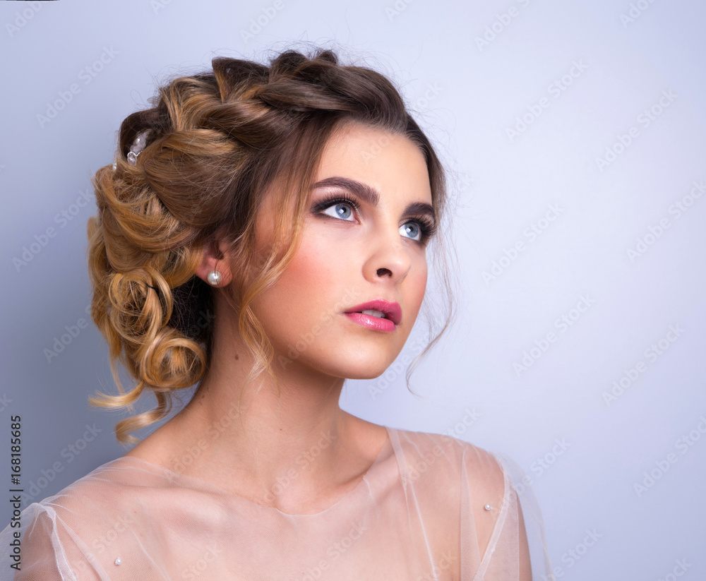 beautiful woman bride with tiara on head on bright background , copy space. beautiful woman bride with tiara on head on bright background , copy space.