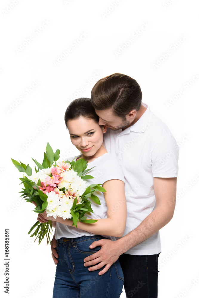 couple with bouquet of flowers