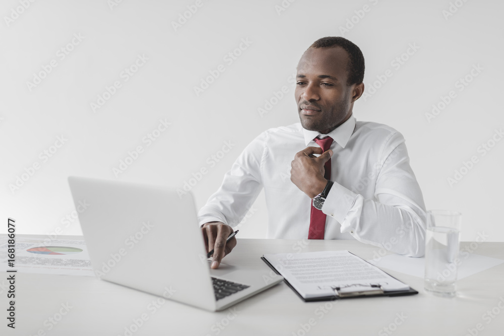 african american businessman working on laptop african american businessman working on laptop