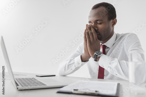 tired african american businessman