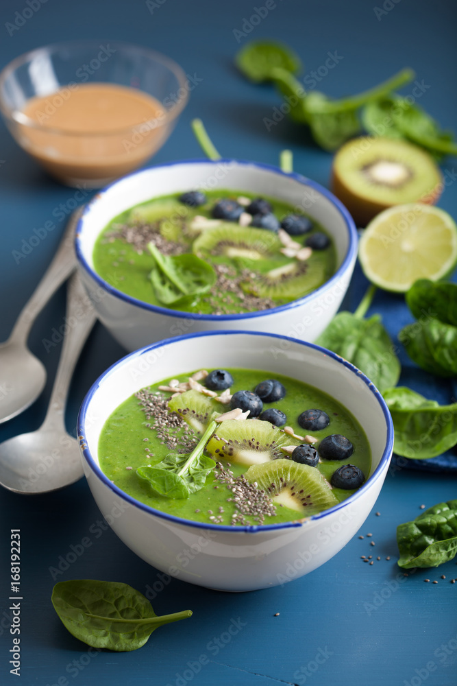 green smoothie bowl spinach kiwi blueberry lime banana with chia seed green smoothie bowl spinach kiwi blueberry lime banana with chia seed