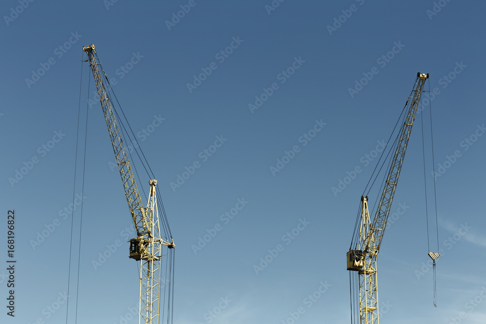 Building crane near a multi-storey building