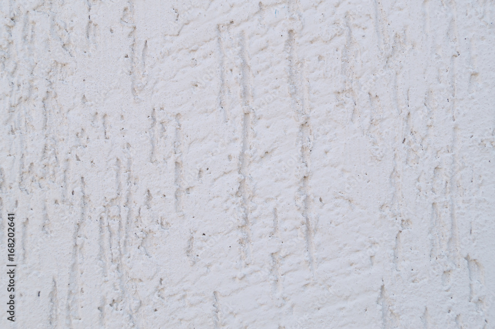 White shabby plaster on the wall as a background, texture White shabby plaster on the wall as a background, texture