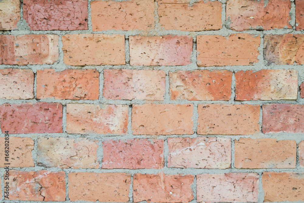 Obraz premium Red decorative brick wall. Masonry, background, texture