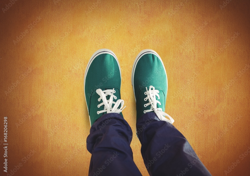 Green shoes on feet with rustic background