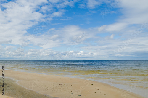 Baltic Sea coastline  with cloudy sky  Latvia.