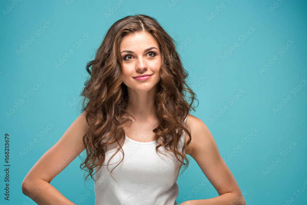 The young woman's portrait with happy emotions The young woman's portrait with happy emotions