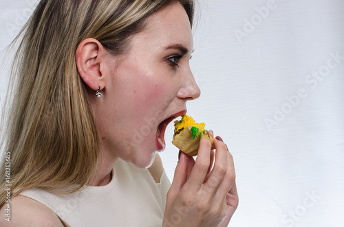 girl in white blouse with cake