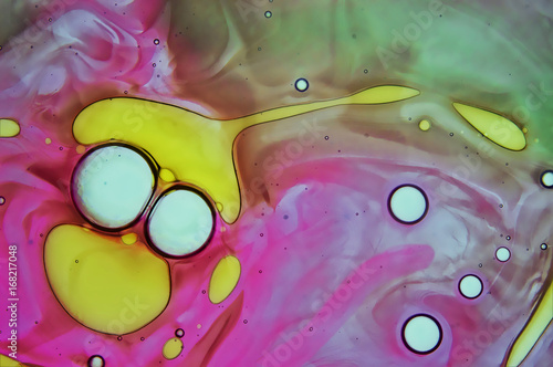 Colourful fluid liquid macro background photo