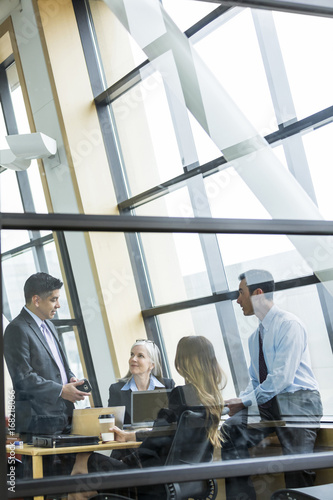 Business people talking in meeting