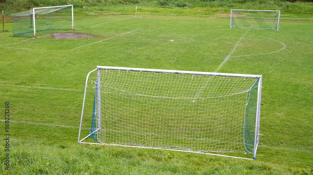 Fototapeta premium Football pitch with three goals