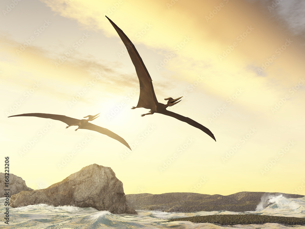 Naklejka premium Pteranodones volando sobre rocas en el mar