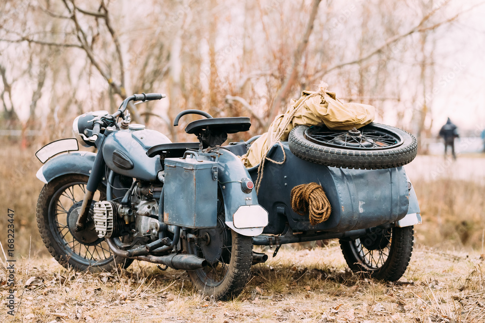 Obraz premium Rarity Three-Wheeled Motorcycle With Sidecar Of German Forces Of