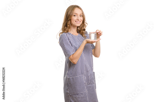 Beautiful young woman with a glass of water