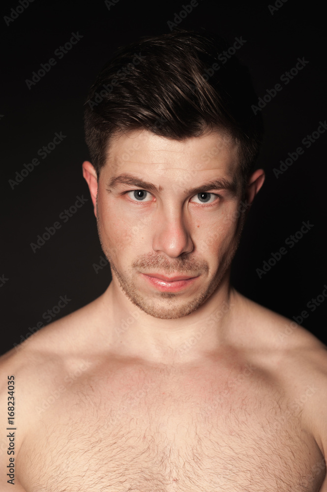 Portrait of sporty man. Caucasian male model in studio shoot. Portrait of sporty man. Caucasian male model in studio shoot.