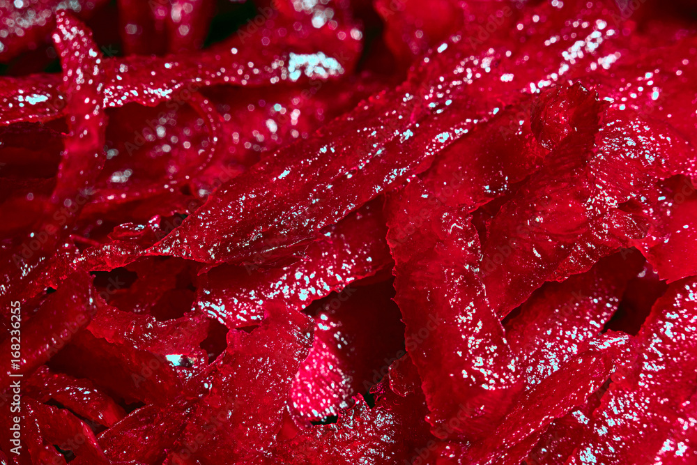 Background of grated beetroot, macro Background of grated beetroot, macro