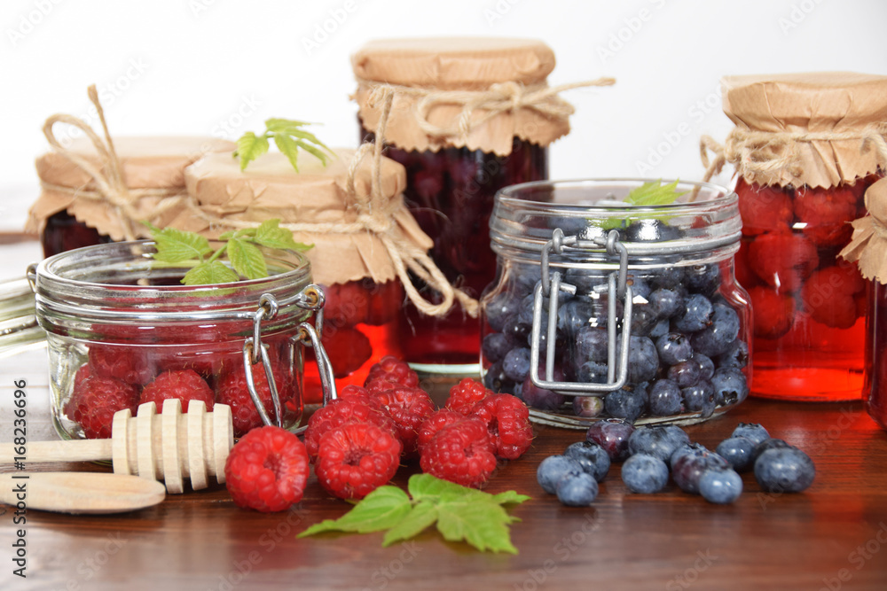 blueberries and raspberries in jars for the winter tea blueberries and raspberries in jars for the winter tea