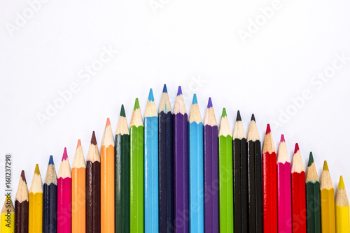Close up of color pencils on white background