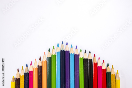 Close up of color pencils on white background