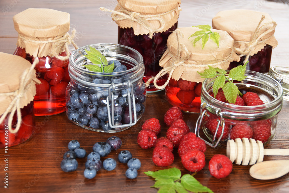 blueberries and raspberries in jars for the winter tea blueberries and raspberries in jars for the winter tea