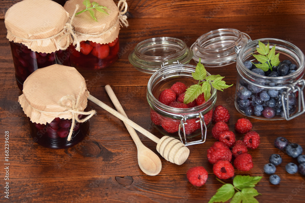 blueberries and raspberries in jars for the winter tea blueberries and raspberries in jars for the winter tea