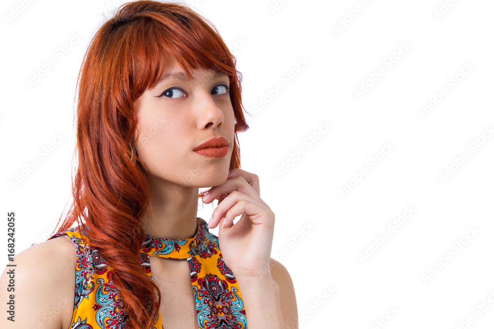 Suspicious girl looks to the side. Young redhead woman with summer dress.. Suspicious girl looks to the side. Young redhead woman with summer dress..