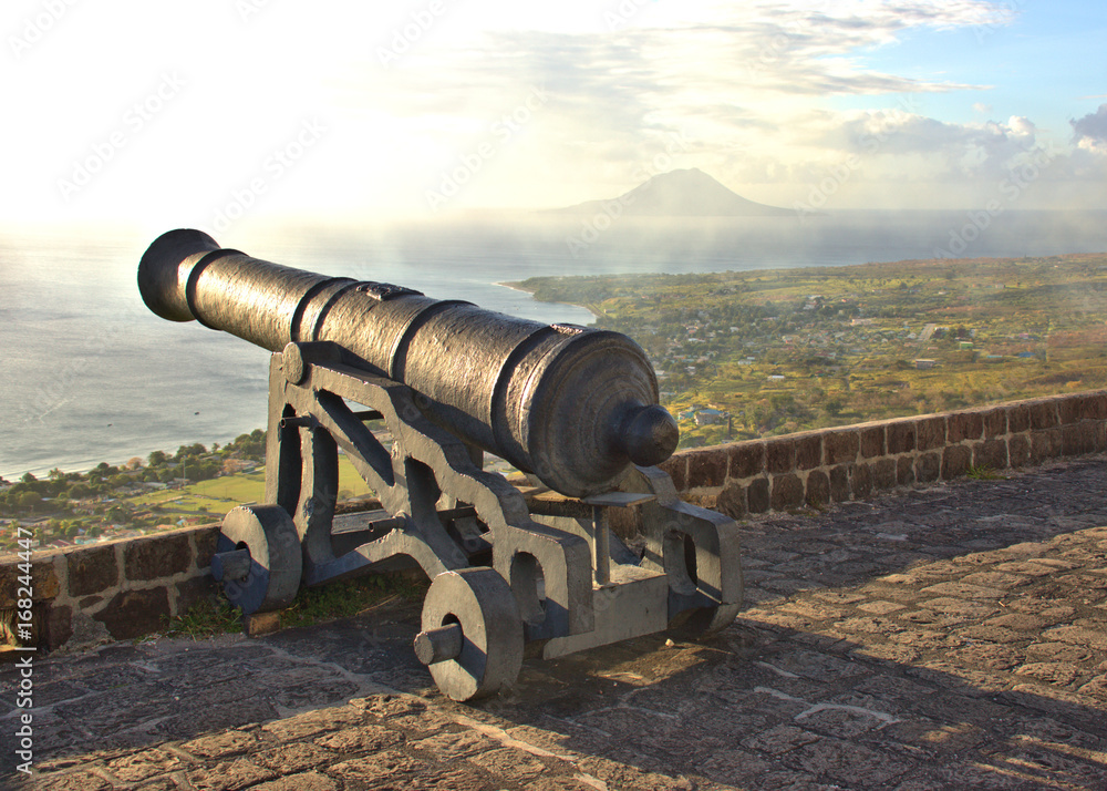 Old cannon in an English fort pointing out to sea Old cannon in an English fort pointing out to sea