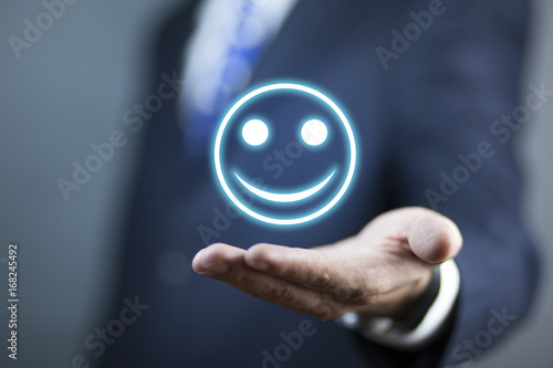 businessman touching smile in screen