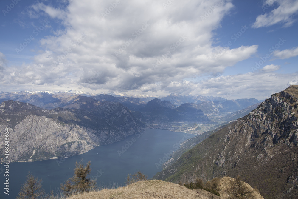 View of Lago di Garda from Monte Baldo with a romantic sky with clouds
