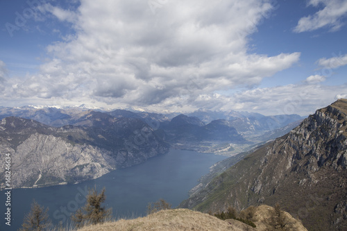 View of Lago di Garda from Monte Baldo with a romantic sky with clouds