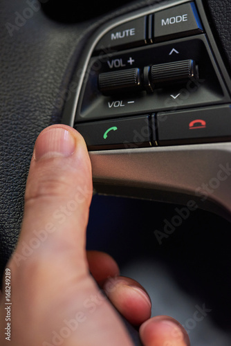 Phone buttons on car wheel
