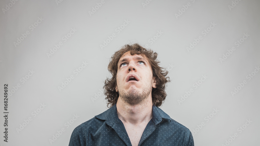 portrait of young bored man portrait of young bored man