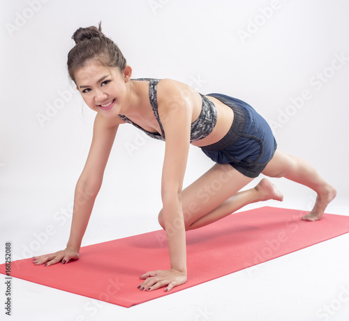 Asian fitness woman exercise in studio