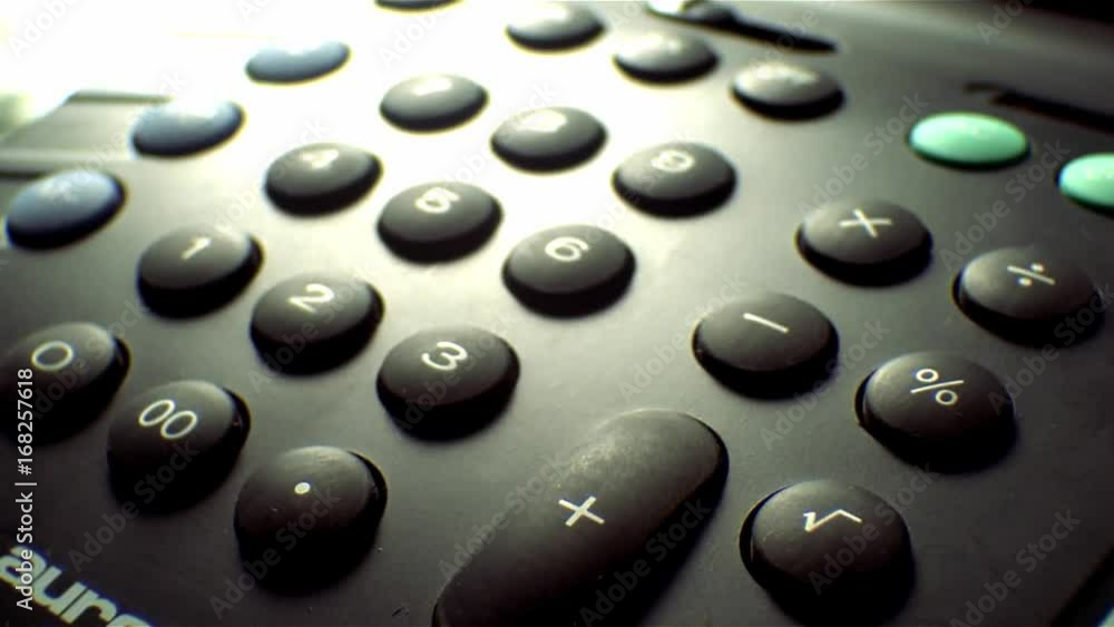 Lingering closeup of a calculator. Lingering closeup of a calculator.