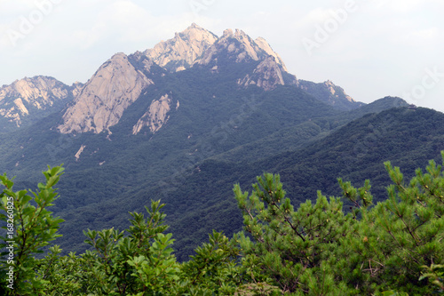 Baegundae peak of Bukhansan Mountain in Bukhansan National Park  is a popular peak to climb  though is steep and exposed with chains and cables to help climbers  Seoul Korea