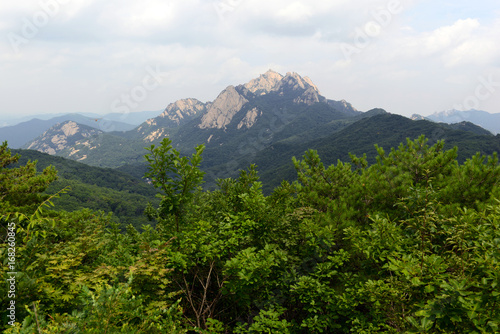 Baegundae peak of Bukhansan Mountain in Bukhansan National Park  is a popular peak to climb  though is steep and exposed with chains and cables to help climbers  Seoul Korea