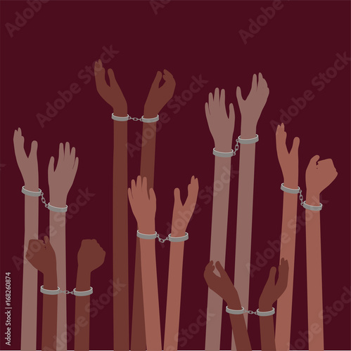 Prisoners or Slaves victims of trafficking with Hands in Handcuffs - Freedom Concept