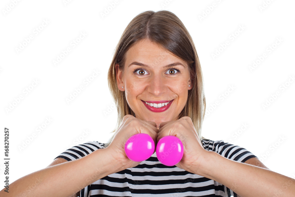 Smiling woman with pink dumbbells Smiling woman with pink dumbbells