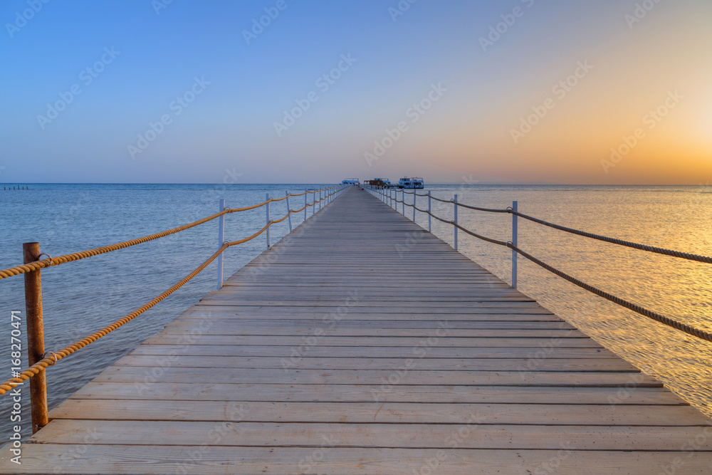 Fototapeta premium Pier on red sea at sunset, Hurghada in Egypt