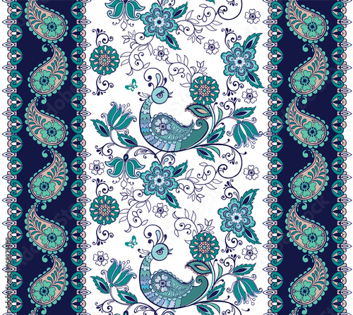 Fantastic blue floral ornament with paisley.Striped pattern with fantastic birds in blue. Floral wallpaper. Decorative ornament for fabric, textile, wrapping paper.